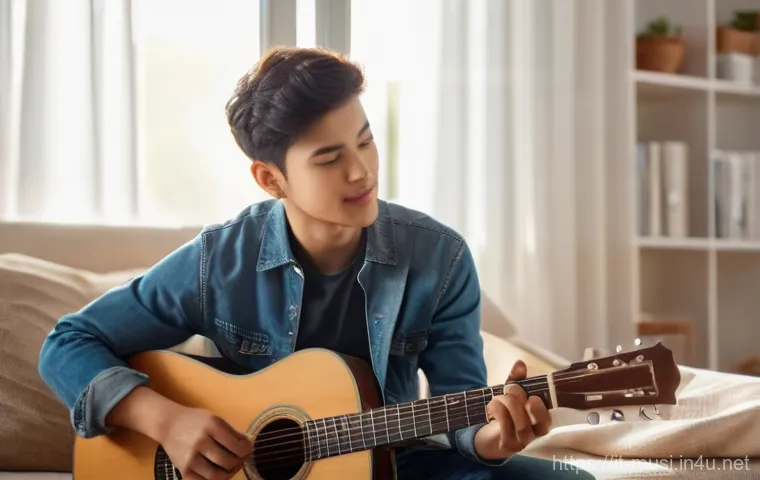 기타 피크 가이드 - 50mm thickness) with a smooth, soft-touch finish. The light catches the subtle flex of the pick as i...