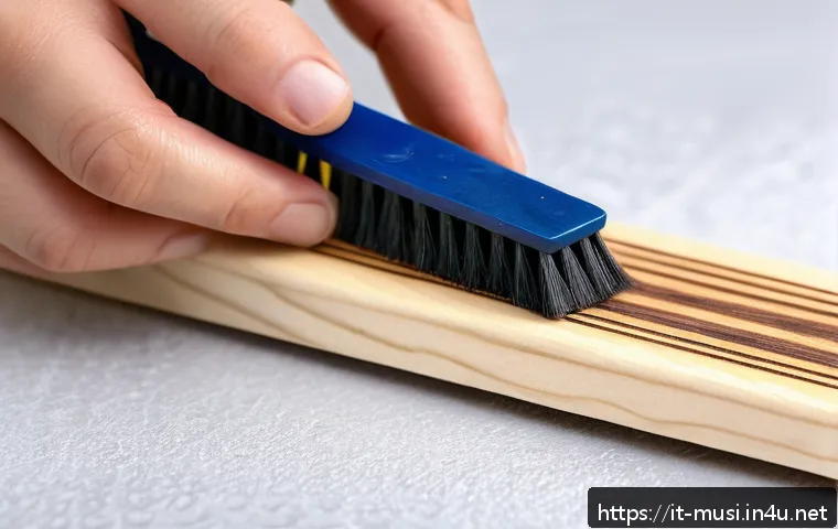 기타 핑거보드 관리 - A detailed close-up scene of a person gently cleaning a fingerboard using a soft-bristle brush and a...